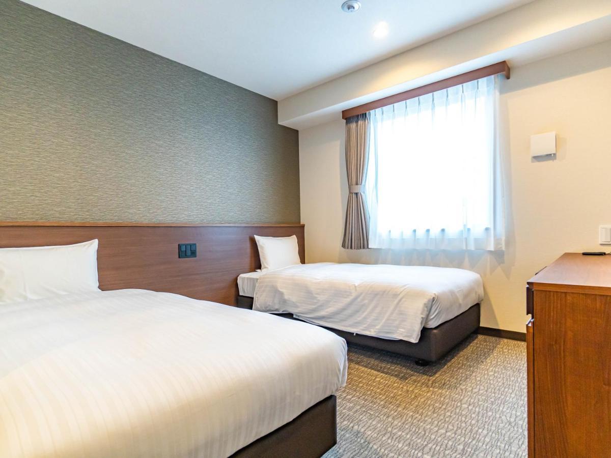 Bande Hotel Tenpozan Higashi Osaka Esterno foto