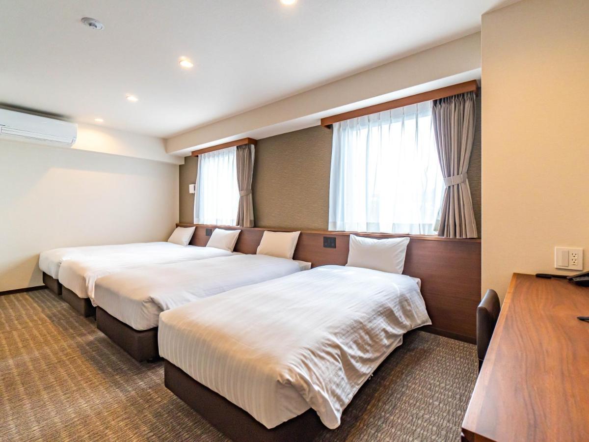 Bande Hotel Tenpozan Higashi Osaka Esterno foto