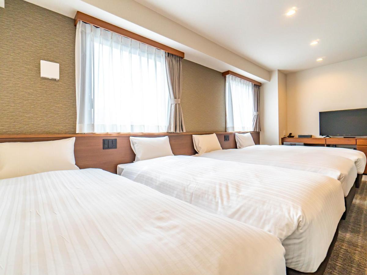 Bande Hotel Tenpozan Higashi Osaka Esterno foto