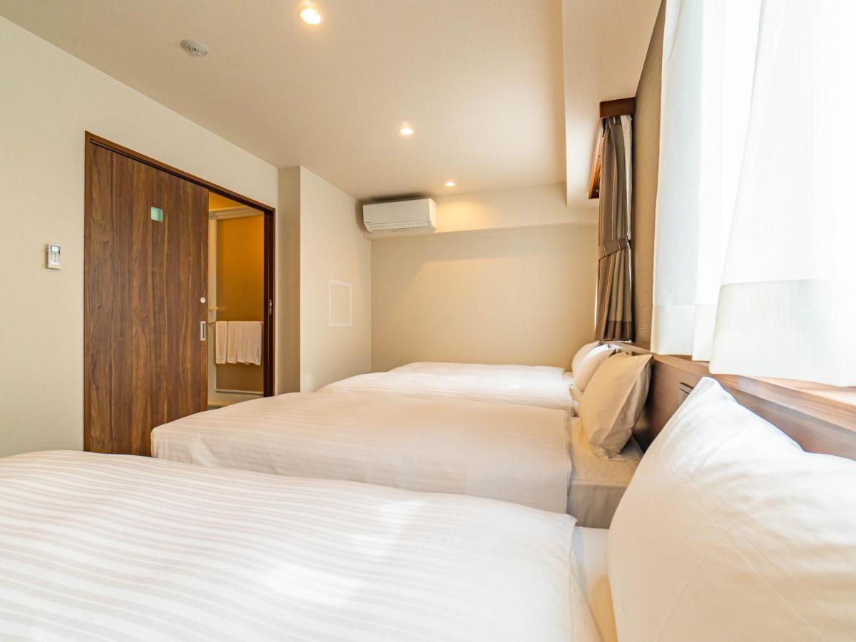 Bande Hotel Tenpozan Higashi Osaka Esterno foto