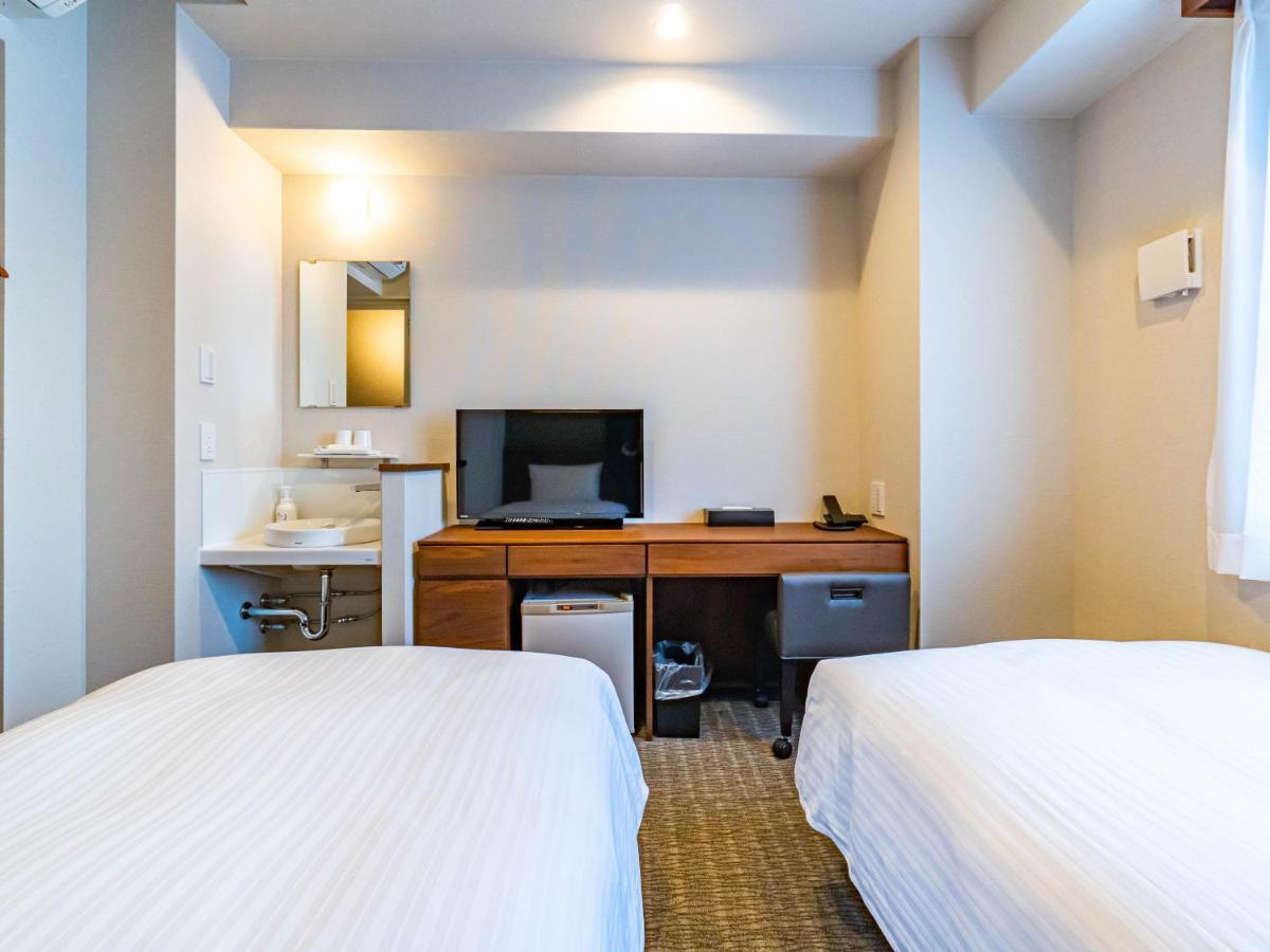 Bande Hotel Tenpozan Higashi Osaka Esterno foto
