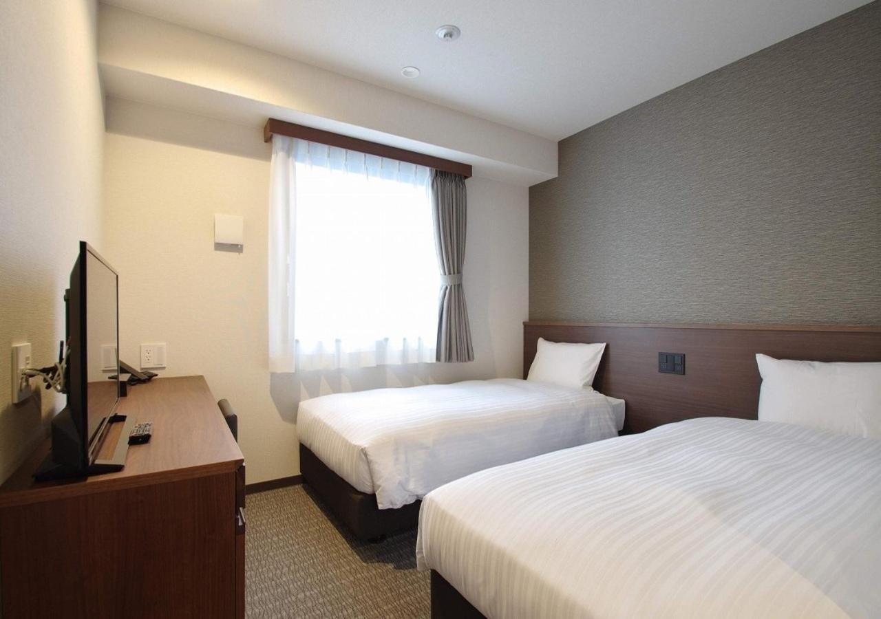 Bande Hotel Tenpozan Higashi Osaka Esterno foto