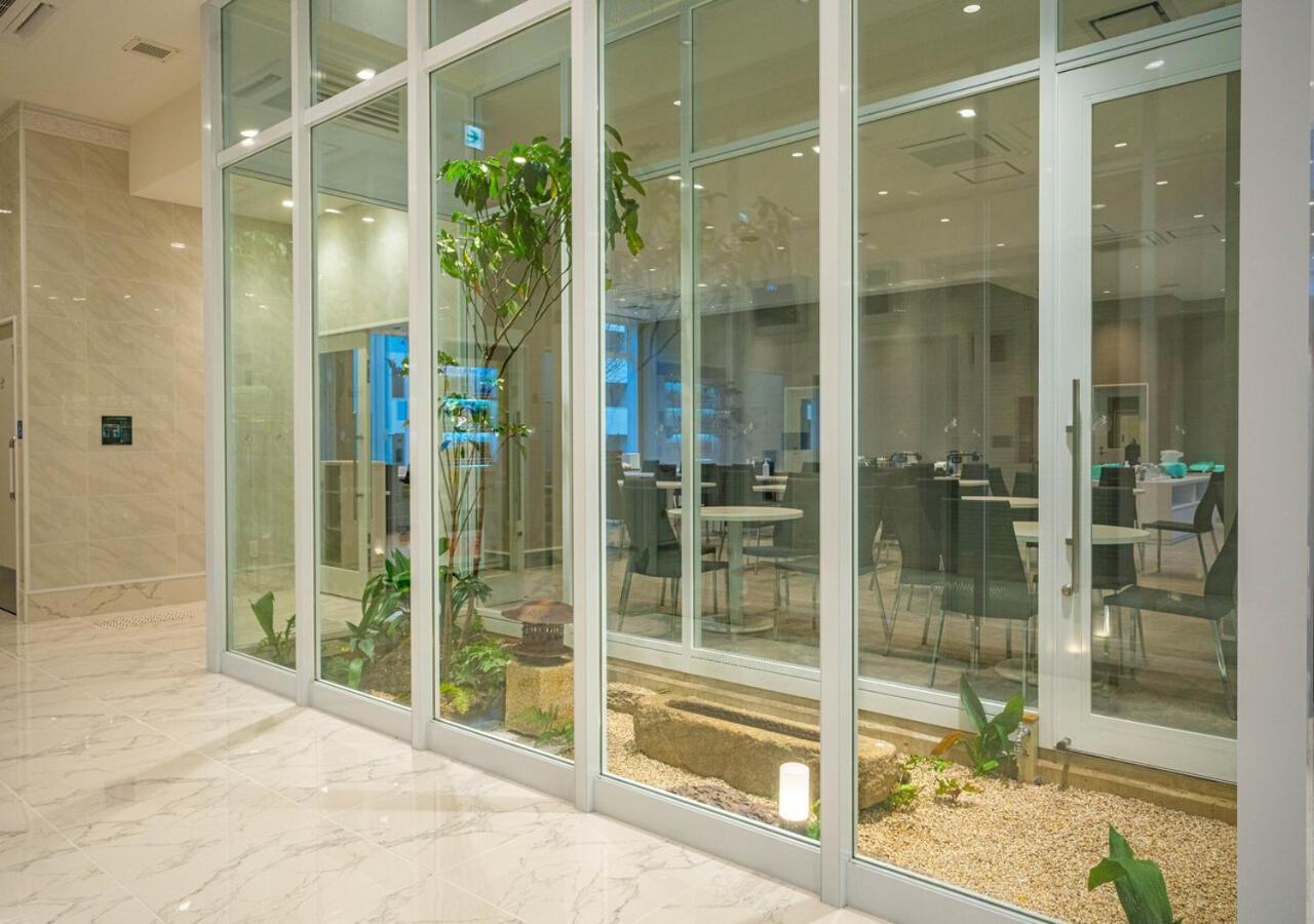 Bande Hotel Tenpozan Higashi Osaka Esterno foto